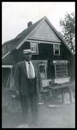 W.H. Bamburg in front of a house in Phoenix