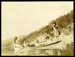 Group in a boat on Otter Lake