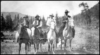 Group of men on horseback