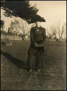 Sister of Gladys Pitts in fancy dress and hat