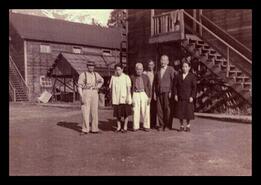 Group of men and women at unidentified Japanese internment camp