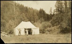 Men in front of tent at C.N.R. camp below the Glenemma Hall