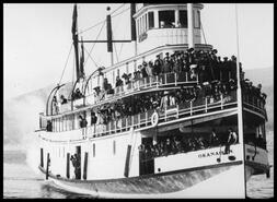 Trial trip for the S.S. Okanagan sternwheeler with  large crowd on front decks