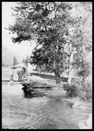 Unidentified women and children on a bridge in Enderby