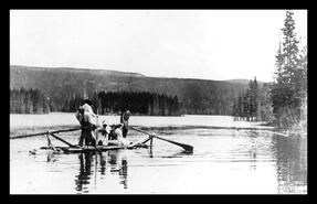 Whipple family on raft on Island Lake