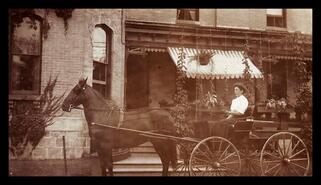 Theresa Goldie driving horse named "Nellie" at side door of the Goldie home in Gore, Ontario