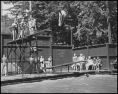 Children at the Jubilee Pool on Victoria Street next to the Legion Memorial Hall, 1950s