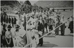 Cutting the ribbon to open the first highway bridge