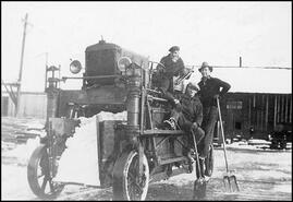 Three men on No.1 carrier at Enderby Sawmill