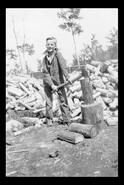 Arthur Ellison Sovereign chopping wood