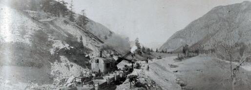 Steam shovel preparing railway bed