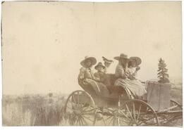 [Group in carriage]