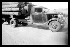 Logging truck with single axle and trailer